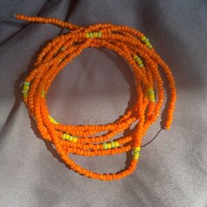 Seed beads . This product is a waist bead .